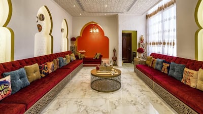 The private majlis features Moorish arches and rich crimson tones. Courtesy LuxuryProperty.com