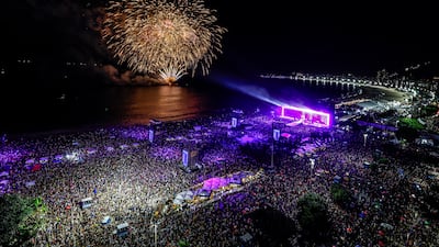 People attend a concert by Colombian singer Shakira on Copacabana Beach in Rio de Janeiro. EPA