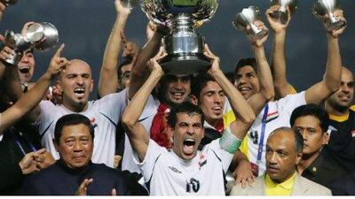 Iraq were the surprise winners of the Asian Cup last time out in July 2007 Younis Khalef, centre, celebrates with teammates.