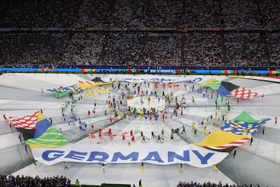 Dancers perform during the opening ceremony ahead of the the match between Germany and Scotland. EPA