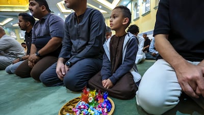 Morning prayers at Bani Hashim Mosque in Abu Dhabi during Eid Al Fitr. Victor Besa / The National