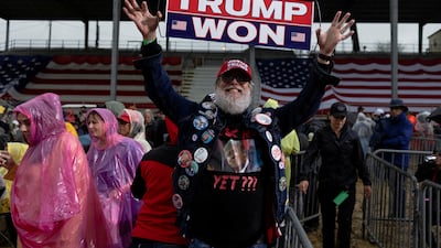 A man poses for a photo before a Trump rally in Pennsylvania. Reuters
