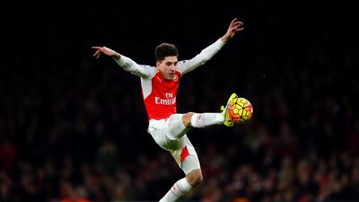 Arsenal’s Hector Bellerin leaps to control the ball on Sunday night during his team’s Premier League match against Chelsea. Shaun Botterill / Getty Images