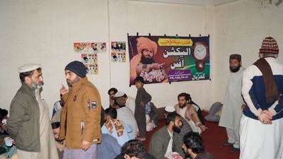 Supporters of Saeed Anwar Mehsud, an independent candidate from South Waziristan, sit inside their campaign office in Dera Ismail Khan. Reuters