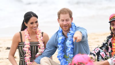 Prince Harry and Meghan, Duchess of Sussex talk to members of OneWave, an awareness group for mental health and well-being, at South Bondi Beach on October 19, 2018 in Sydney, Australia. Getty Images