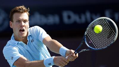 Tomas Berdych returns a shot to Jeremy Chardy during their ATP Dubai Duty Free Tennis Championships first round match on Tuesday. Ali Haider / EPA