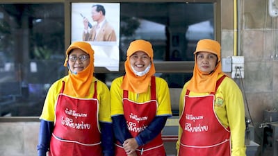 Above, workers at a rice mill in Khon Kaen. Thailand may tap into state inventories next year to maintain export levels to offset a possible decline in production due to dry weather. Jorge Silva / Reuters