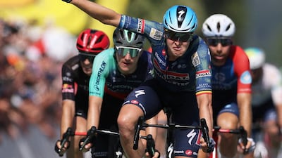 Soudal Quick-Step's Tim Merlier celebrates after crossing the finish line to win stage 8 of the 2026 Tour de France. Reuters