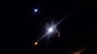 Iranian state TV (IRIB) shows rockets lunched from Iran against the US military base in Ein Al Asad. EPA