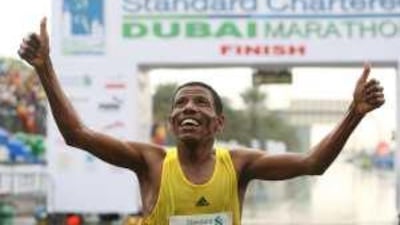 Haile Gebrselassie rejoices at winning the race with a time of 2:05:29 in the Standard Chartered Dubai Marathon 2009 in Dubai.