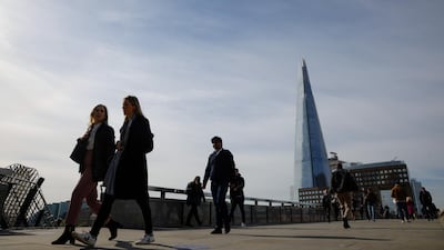 Commuters walk along London Bridge in the UK. The monthly index of demand for workers from accountancy firm KPMG and the Recruitment and Employment Confederation (REC) rose to its highest level in just over 23 years in April. Bloomberg