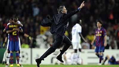 Jose Mourinho, the Inter Milan coach, celebrates after knocking out Barcelona at the Camp Nou on Wednesday night.