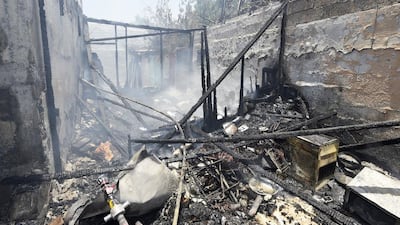 The fire in Al Ghafia that claimed three lives completely destroyed a home. Courtesy Sharjah Police Department