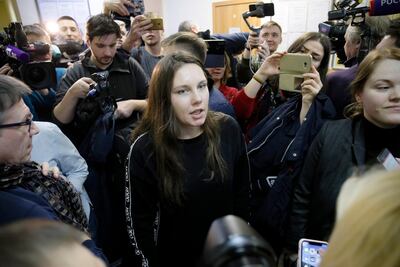 Alla Ilyina, who broke out of the hospital on February 7 after learning that she would have to spend 14 days in isolation instead of the 24 hours doctors promised her, speaks to the Media in a courtroom in St Petersburg, Russia. AP