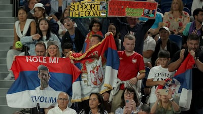 Novak Djokovic fans show their support by displaying Serbia flags inside Rod Laver Arena. Getty Images
