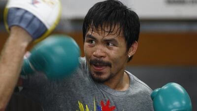 Manny Pacquiao’s last fight was a points-decision defeat to Floyd Mayweather in Las Vegas. Mike Young / The National