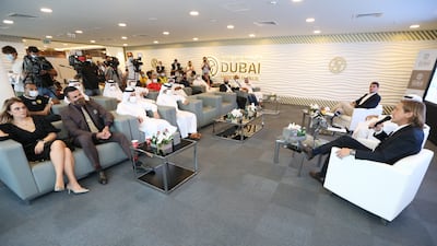 Iker Casillas, third right, and Secretary General of Dubai Sports Council Saeed Hareb listen as former Real Madrid and Spain defender Michel Salgado speaks.