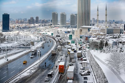 Hundreds of cars and trucks remained stranded on a main road in Istanbul on Tuesday. AP
