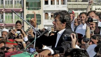 Pakistani cricketer-turned politician Imran Khan addresses his supporters during a rally in the northwestern city of Mingora. His Movement for Justice party appeals to a young, urban constituency tired of the corruption that plagues the system.