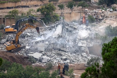 Israel demolishes Palestinian-owned buildings in Al Saqi area, north of Ramallah, in the occupied West Bank. AFP