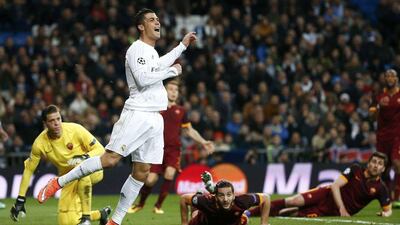 Real Madrid forward Cristiano Ronaldo reacts after missing a goalscoring chance. Juan Medina / Reuters