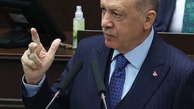 Turkish President Recep Tayyip Erdogan met the leaders of two Iraqi parties competing for the Sunni vote in the coming elections. AFP