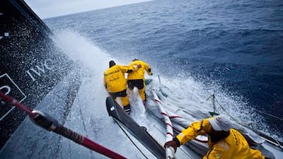 Wade Morgan and Anthony Nossiter during a sail change onboard Abu Dhabi Ocean Racing