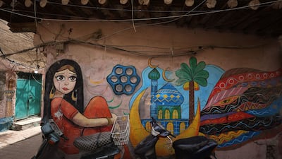 A colourful mural brightens an underpass