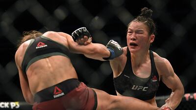 Weili Zhang, right, punches Joanna Jedrzejczyk in her split decision win during a strawweight title bout at T-Mobile Arena on March 07, 2020 in Las Vegas, Nevada. Getty Images