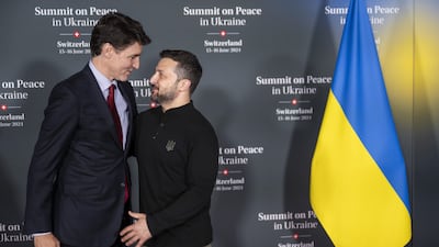 Canadian Prime Minister Justin Trudeau, left, with Mr Zelenskyy. EPA