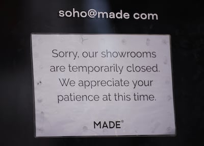 A sign in the window of the Made.com store in Charing cross Road. PA