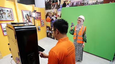 People get a souvenir photo from the visitor centre. Expo 2020 Dubai Open Doors. Chris Whiteoak / The National