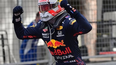 Red Bull's Max Verstappen celebrates as he gets out of his car after winning the Monaco Grand Prix on Sunday. AFP