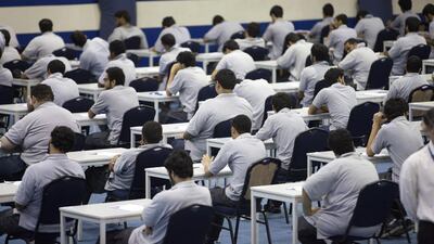 The advance of technology has arguably made cheating in exams much easier. Jaime Puebla / The National