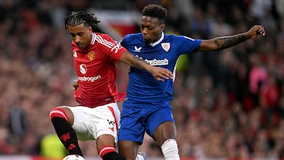 Manchester United defender Leny Yoro, left, fends off Athletic Club's Alvaro Djalo. AFP