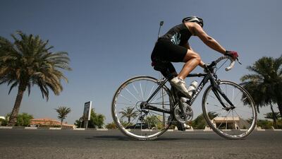 A cyclist riding at Al Sufouh 1 in Dubai. Triathlete Medhi Karasane was hit by a car while cycling in Abu Dhabi on November 9, bringing to question the safety of the cyclists once more, just two months after another triathlete, Roy Nasr, was killed by a drunk driver while training. Pawan Singh / The National