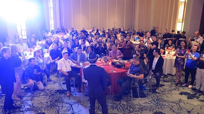 Manny Pacquiao addresses the crowd during the Christmas party. Jake Verzosa for The National