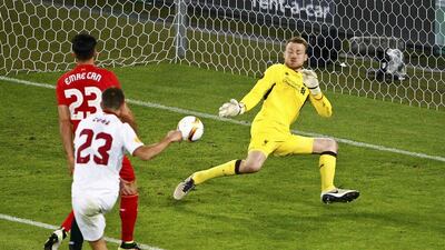 Coke scores his second goal and Sevilla's third to go 3-1 up against Liverpool. Arnd Wiegmann / Reuters