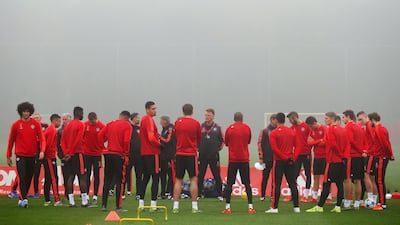 Louis van Gaal manager of Manchester United and players look on during a foggy Manchester United training session on the eve of the UEFA Champions League Group B match against CSKA Moscow. Getty