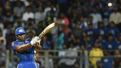 Mumbai Indians cricketer Kieron Pollard plays a shot during the 2019 Indian Premier League (IPL) Twenty20 cricket match between Mumbai Indians and Kings XI Punjab at the Wankhede cricket stadium in Mumbai, on April 10, 2019. (Photo by Indranil MUKHERJEE / AFP) / ----IMAGE RESTRICTED TO EDITORIAL USE - STRICTLY NO COMMERCIAL USE----- / GETTYOUT