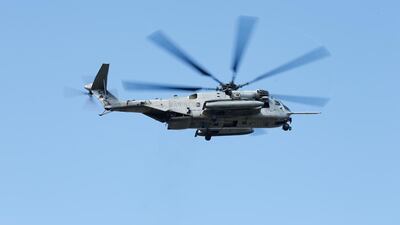 Above, the Sikorsky CH-53E Super Stallion, the most powerful helicopter in the US military. Scott Boehm via AP