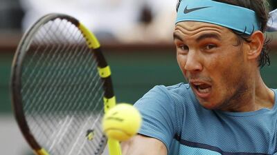Rafael Nadal returns a shot against Facundo Bagnis. Pascal Rossignol / Reuters