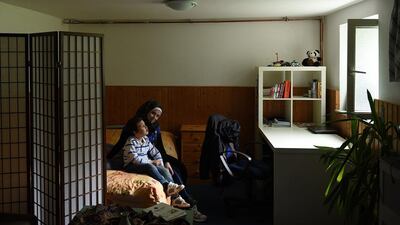Reem and sit on the bed in the basement room of the community centre of the church congregation Kreuzkirche where they live in Hamburg. Wael arrived in Germany on his own eight months ago and lived for the first five months in a shelter for migrants in Hamburg’s Wilhelmsburg island district. German authorities initially sought to deport him to Spain after they found out that was where he first entered the European Union. Wael, who speaks English, made contact with a local aid organisation called ‘Die Insel Hilft’ (The Island Helps), who offered legal assistance and eventually offered him to stay at the community center of the Kreuzkirche church congregation. Astrid Riecken / Getty Images