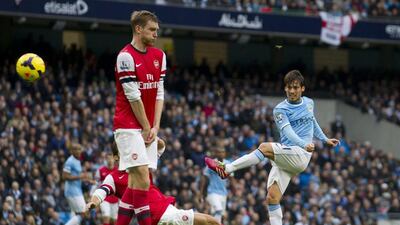 David Silva scored Manchester City's fourth goal on Saturday. Jon Super / AP