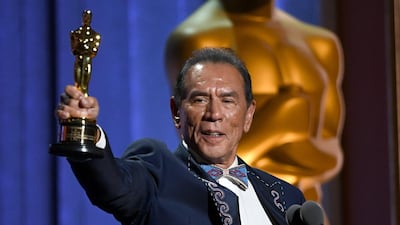 Wes Studi accepts his Oscar at the Governors Awards on Sunday night. AFP