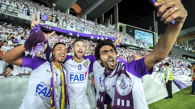 Al Ain players celebrate their President's Cup title after beating Al Wasl 2-1. Victor Besa / The National
