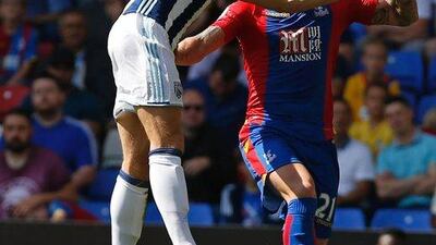 Jonny Evans, left. (Ian Kington / AFP)