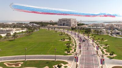 Al Fursan acrobatics squadron flies over Qasr Al Watan, Abu Dhabi's presidential palace. Courtesy: Ministry of Presidential Affairs