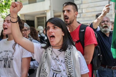 Activists outside the Foreign Ministry in Athens. Reuters