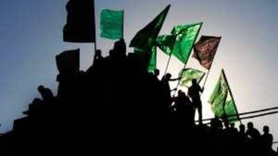 Palestinian supporters of the Hamas movement demonstrate in Gaza City in protest at an attempt to arrest a senior Hamas commander in the West Bank town of Qalqilya at the end of last month.